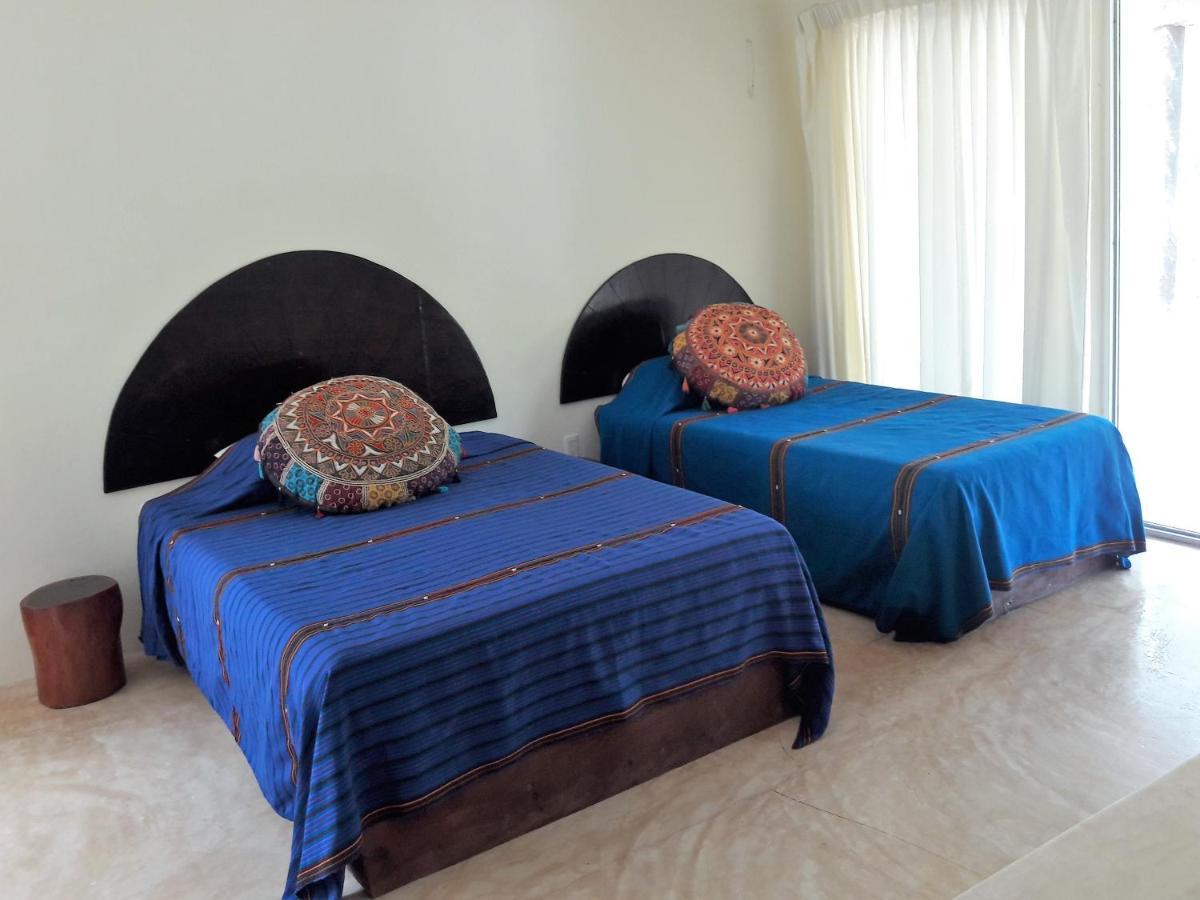 Lunah Xcacel Suites Chemuyil Rom bilde
